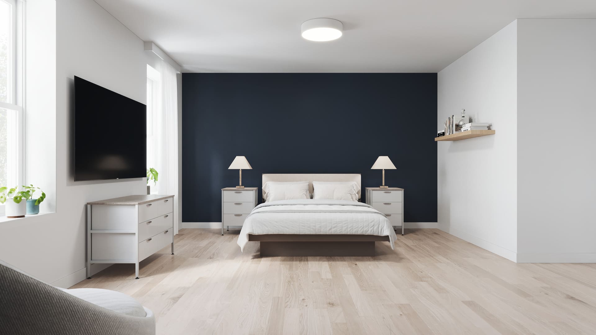 The King, featuring a luxurious king-sized bed, a modern sitting area, and a dedicated workspace.