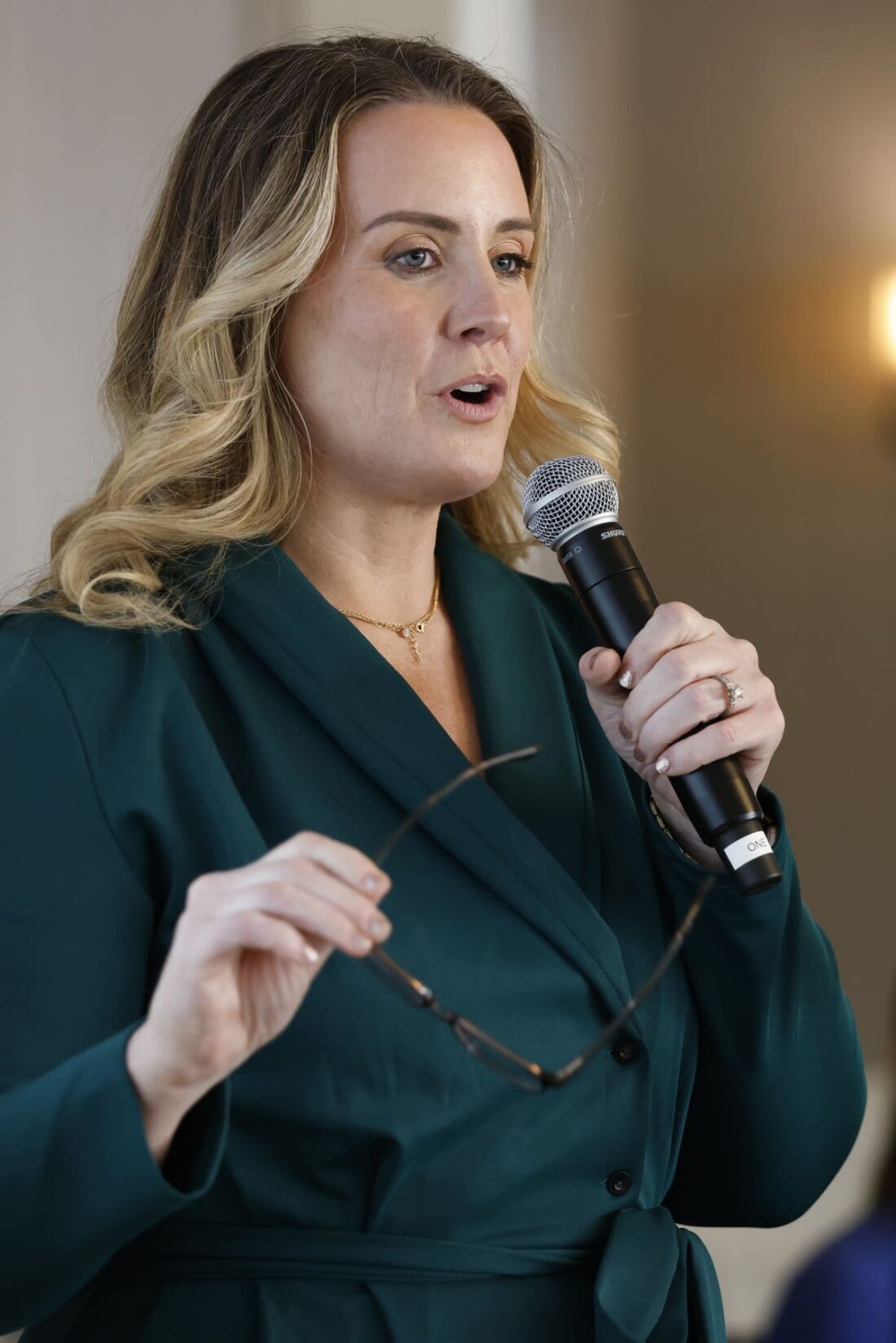 Ana McKenna, Interim Program Director of Easterseals NH Military & Veterans Campus speaks to attendees about the services offered on Campus.